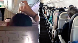 Passenger's bizarre use of drinking glass on flight leaves travelers horrified Sydney Private Schools